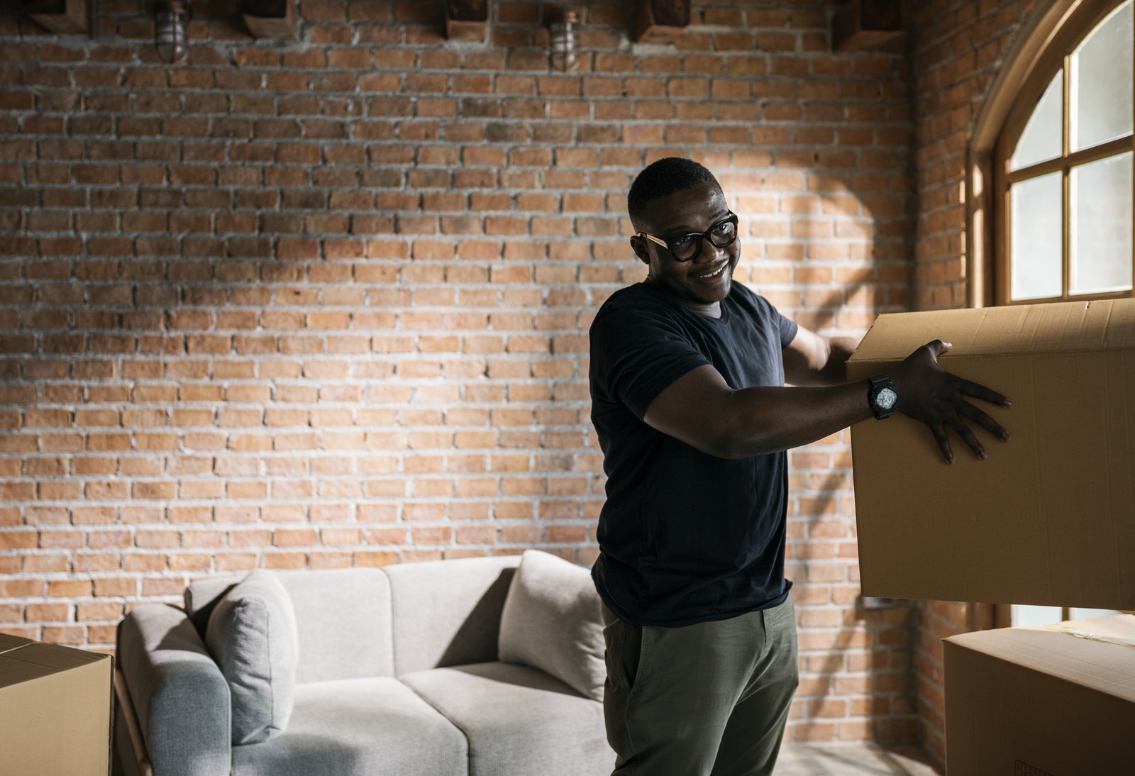 Man packing boxes for a local home move