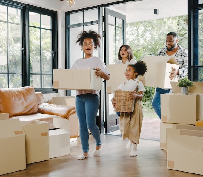 Happy African Family moving into a new house_7861-3095
