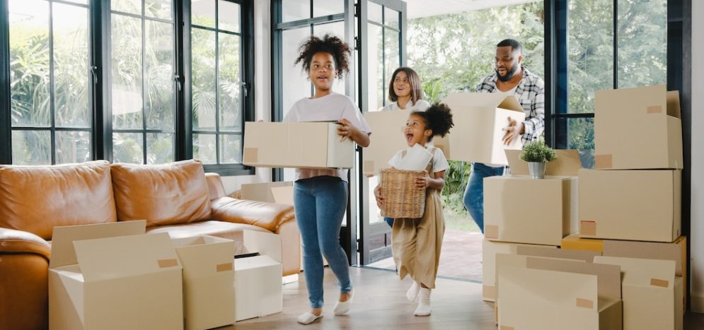 Happy African Family moving into a new house_7861-3095
